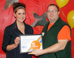 Katie Avila accepting the United Way Impressive Increase Award Katie Avila accepting the United Way Impressive Increase Award