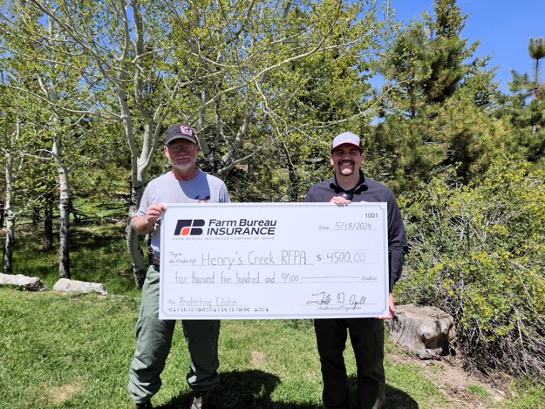 FBICI donates to support wildfire protection, image of check presentation